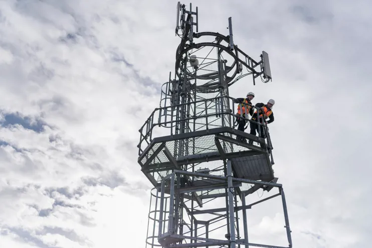 Engineers On Transmission Tower